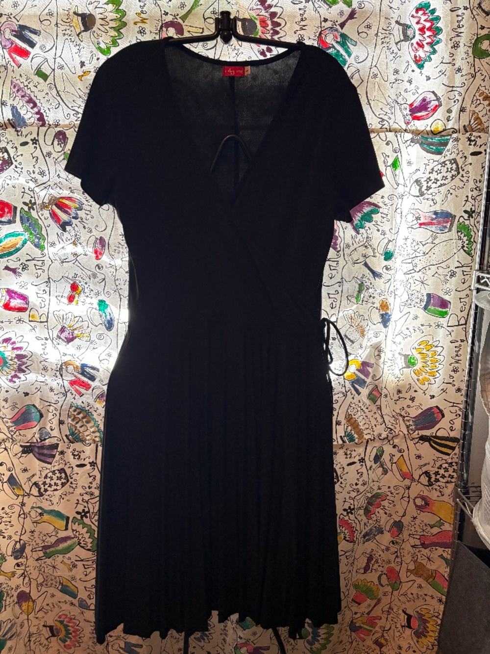 Ruby Rox faux wrap dress with pleated skirt.